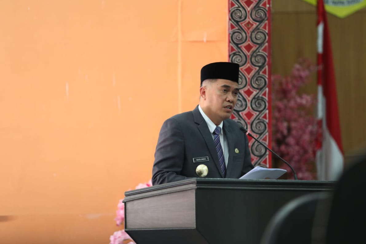 Pjs. Bupati Pakpak Bharat Naslindo Sirait Menyampaikan Nota Jawaban Bupati Atas Ranperda APBD Tahun 2025